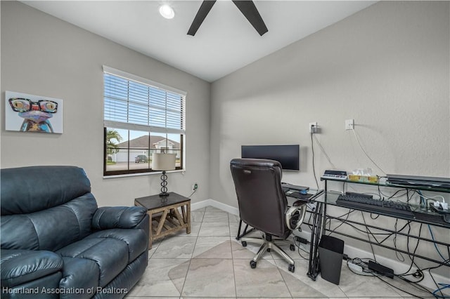 home office featuring ceiling fan and lofted ceiling