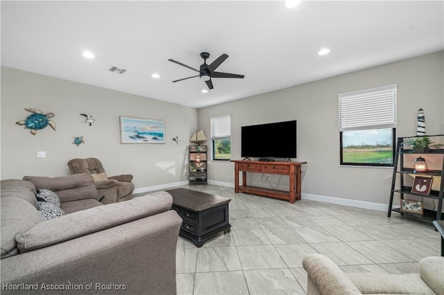 living room featuring ceiling fan