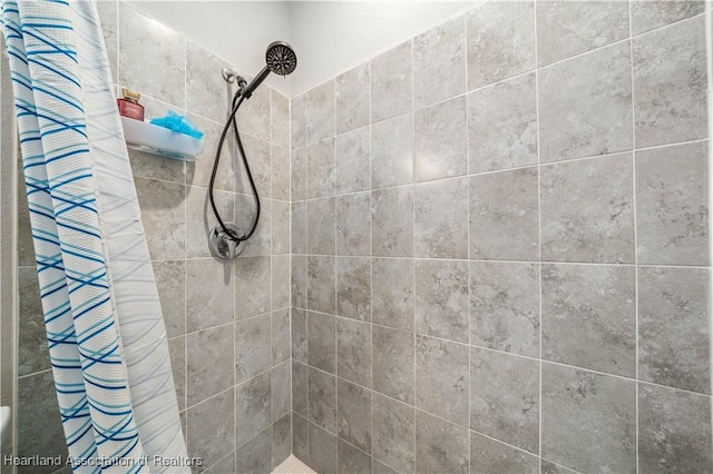 bathroom with curtained shower