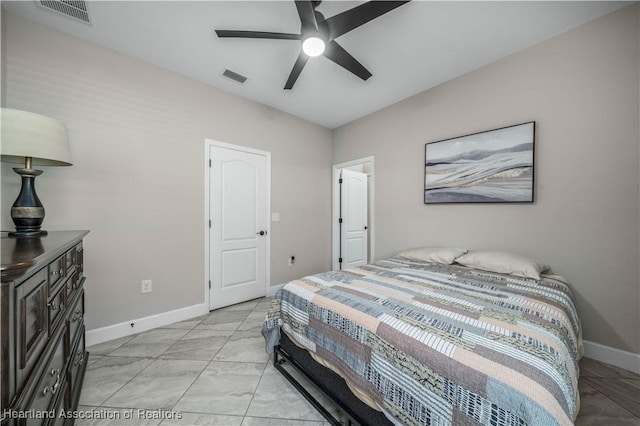 bedroom featuring ceiling fan