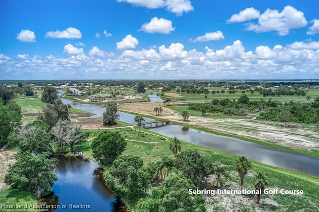 birds eye view of property with a water view and a rural view