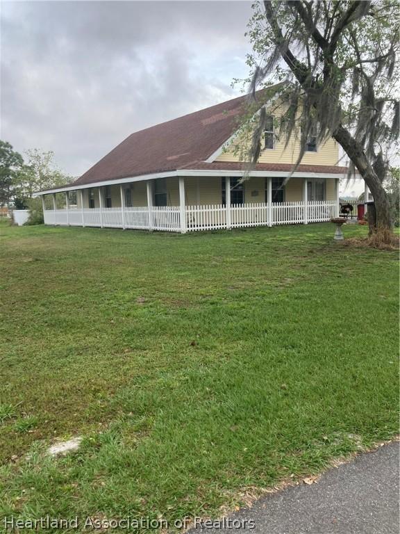 view of front of home with a front yard