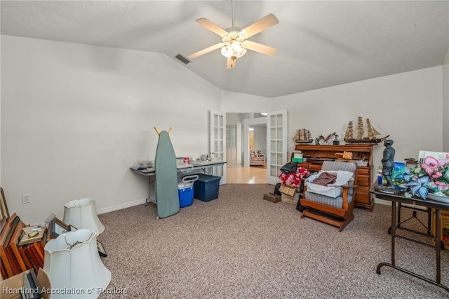 carpeted bedroom featuring french doors, vaulted ceiling, and ceiling fan