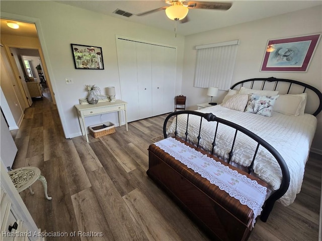 1725 Amber Ln, Lake Placid, FL 33852 - bedroom with wood finished floors, a closet, and ceiling fan