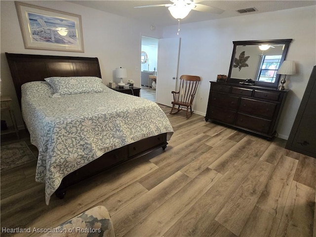 1725 Amber Ln, Lake Placid, FL 33852 - bedroom featuring wood finished floors and a ceiling fan