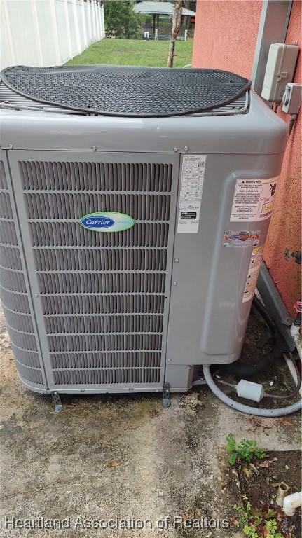 1725 Amber Ln, Lake Placid, FL 33852 - exterior view of a central AC unit