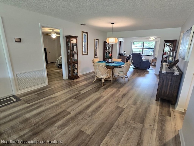 1725 Amber Ln, Lake Placid, FL 33852 - dining space with wood finished floors, a textured ceiling, and ceiling fan
