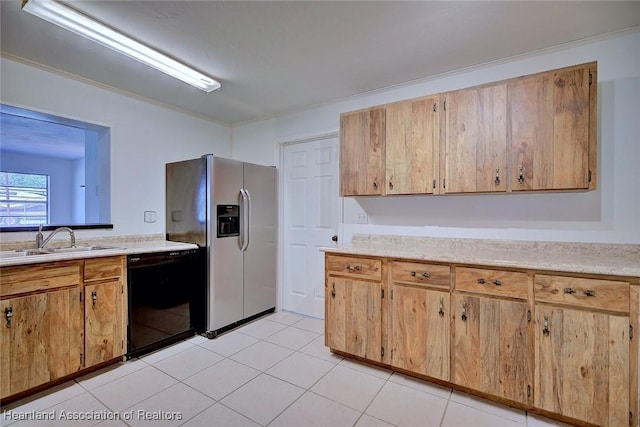 kitchen featuring black dishwasher, stainless steel refrigerator with ice dispenser, a sink, and light countertops