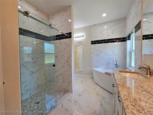 bathroom featuring tiled shower, vanity, recessed lighting, marble finish floor, and a freestanding bath