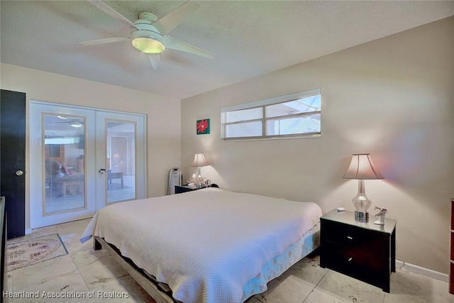 bedroom with access to outside, baseboards, ceiling fan, and french doors