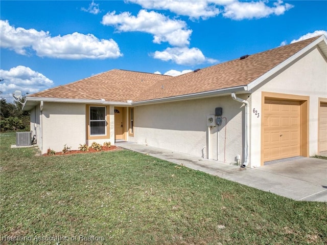 single story home with central air condition unit, a front yard, and a garage