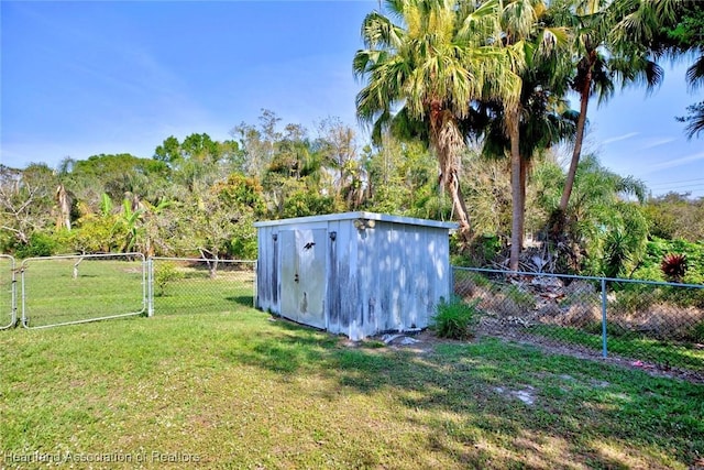 view of shed featuring fence