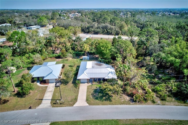 aerial view featuring a view of trees