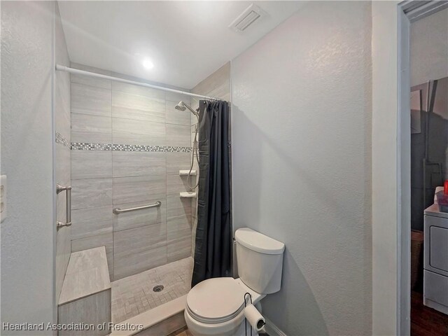 21 N French Ave, Fort Meade, FL 33841 - full bath with toilet, a shower stall, and washer / clothes dryer