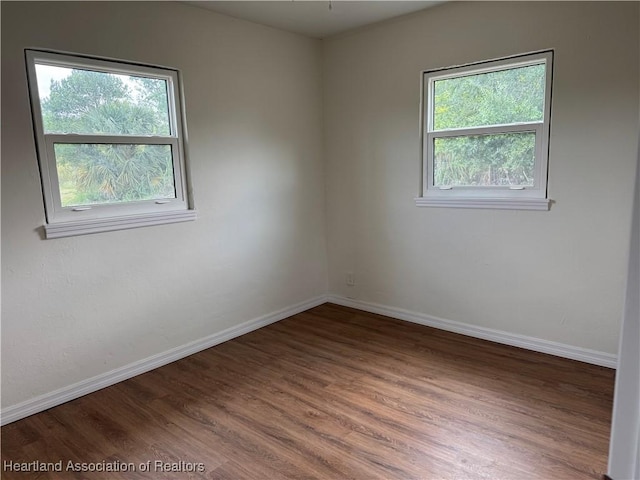 4504 High Ave, Sebring, FL 33870 - unfurnished room with wood finished floors and baseboards