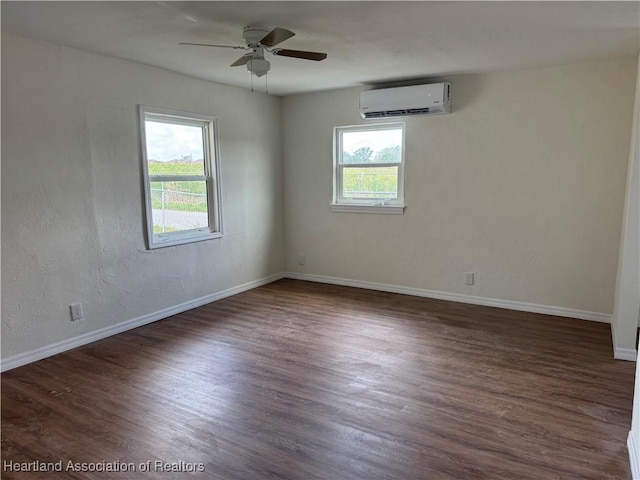 4504 High Ave, Sebring, FL 33870 - spare room with healthy amount of natural light, a ceiling fan, a wall mounted AC, and dark wood-type flooring