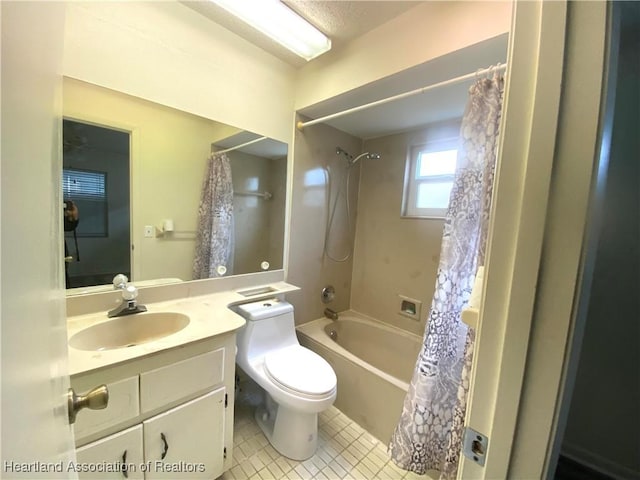 full bathroom featuring shower / bath combination with curtain, tile patterned floors, toilet, and vanity