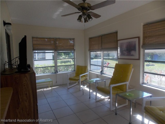 interior space featuring plenty of natural light and ceiling fan