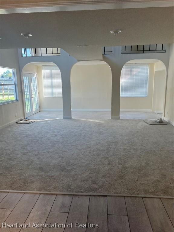 empty room with hardwood / wood-style flooring