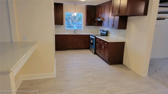 kitchen featuring sink, light hardwood / wood-style floors, decorative light fixtures, electric stove, and decorative backsplash