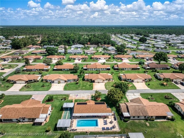 3730 Camry Ct, Sebring, FL 33872 - aerial view of residential area featuring a pool