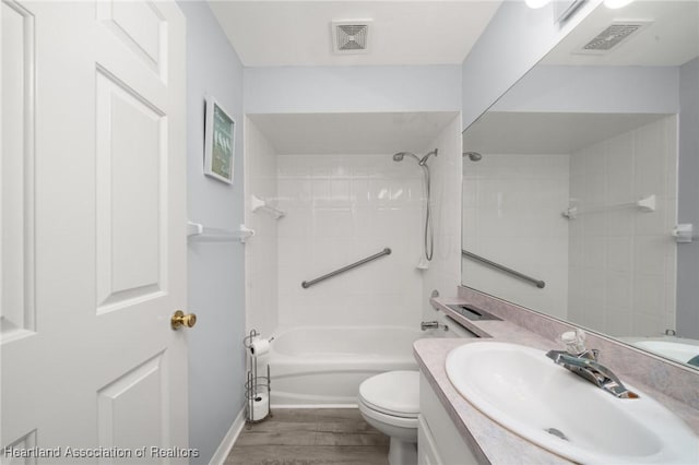 3730 Camry Ct, Sebring, FL 33872 - bathroom with wood finished floors, vanity, and  shower combination