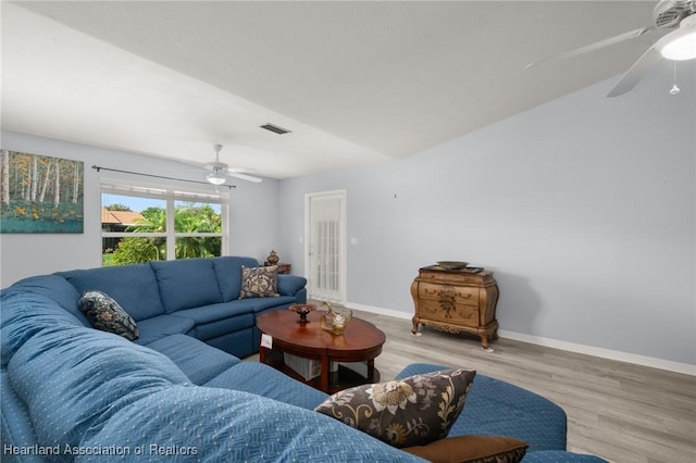 3730 Camry Ct, Sebring, FL 33872 - living room featuring a ceiling fan and wood finished floors