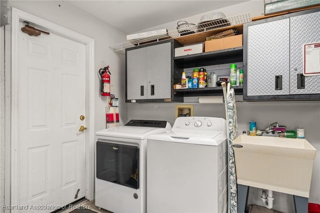 3730 Camry Ct, Sebring, FL 33872 - laundry area featuring washer and dryer and a sink