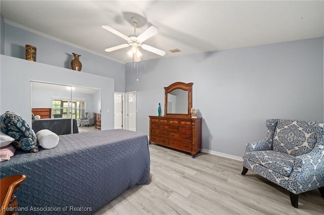 3730 Camry Ct, Sebring, FL 33872 - bedroom with wood finished floors, ceiling fan, a closet, a towering ceiling, and ornamental molding