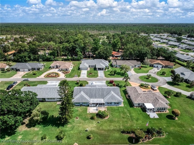 3730 Camry Ct, Sebring, FL 33872 - aerial view of residential area featuring a forest