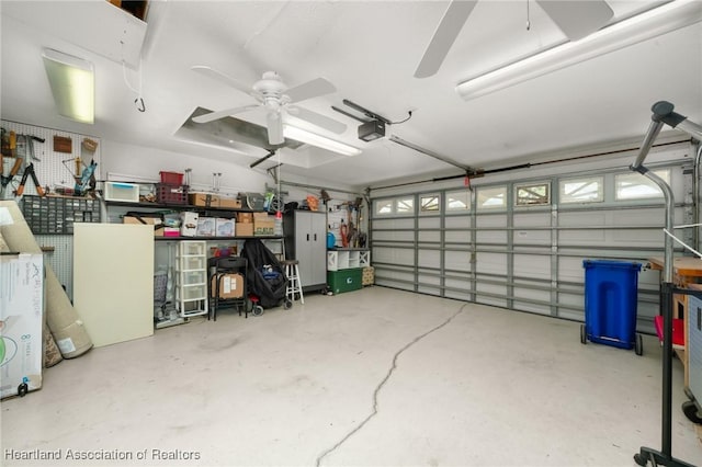 3730 Camry Ct, Sebring, FL 33872 - garage featuring a garage door opener and a ceiling fan