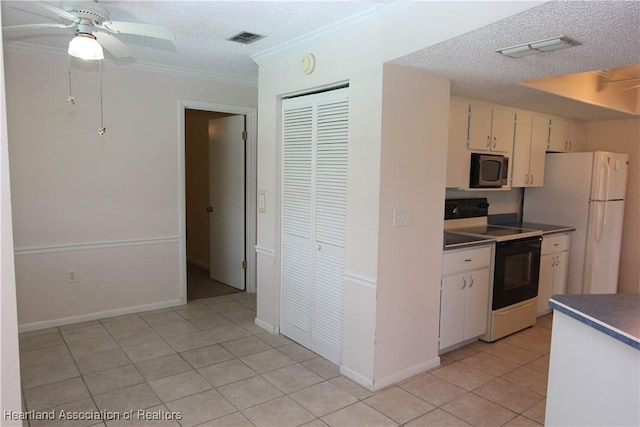 kitchen with a textured ceiling, white appliances, ceiling fan, and crown molding