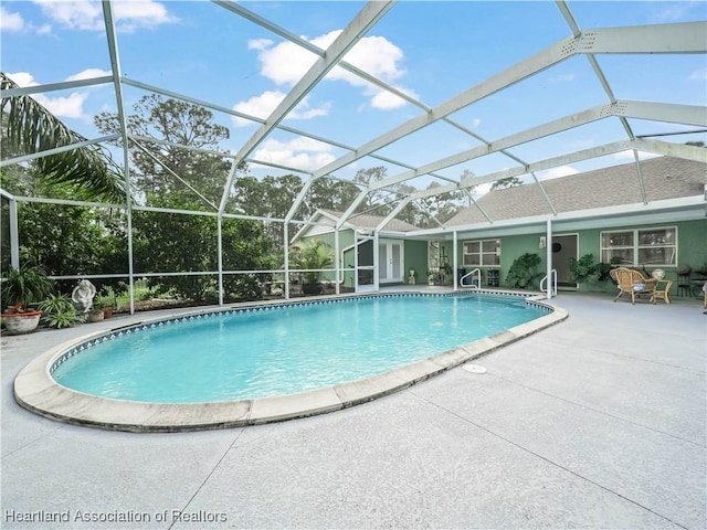 pool featuring a patio and a lanai