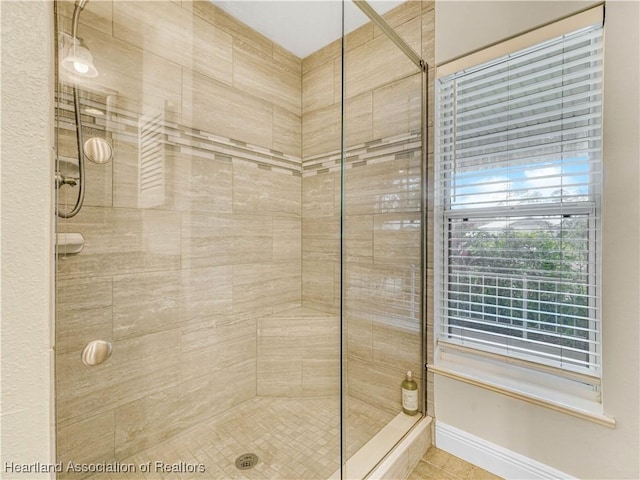 full bathroom featuring a stall shower