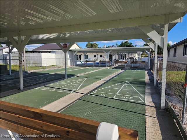 102 Oak St, Lake Placid, FL 33852 - view of home's community featuring fence and shuffleboard
