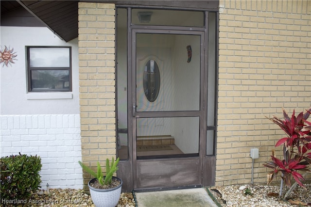 102 Oak St, Lake Placid, FL 33852 - property entrance with brick siding