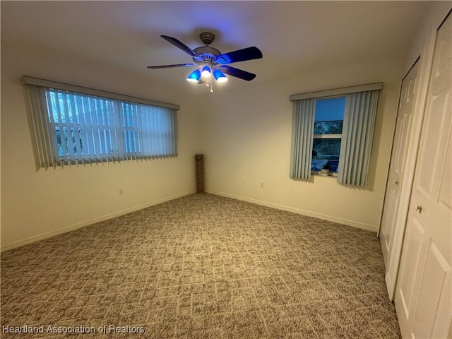 246 Thurman Ave, Lake Placid, FL 33852 - unfurnished bedroom with carpet, baseboards, and a ceiling fan