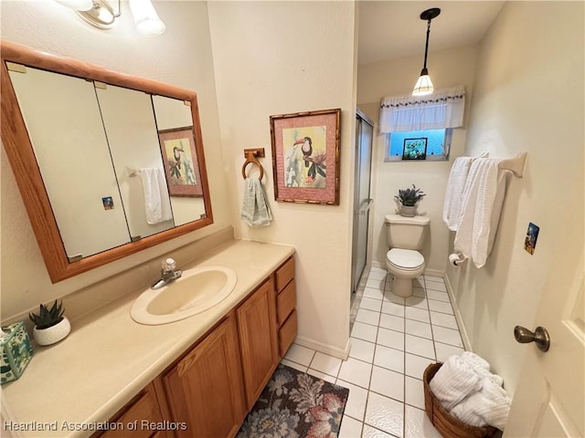246 Thurman Ave, Lake Placid, FL 33852 - bathroom with tile patterned flooring, a stall shower, vanity, toilet, and baseboards
