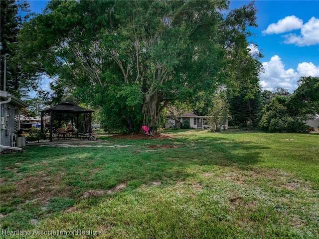 301 Sparrow Ave, Sebring, FL 33870 - view of grassy yard featuring a gazebo