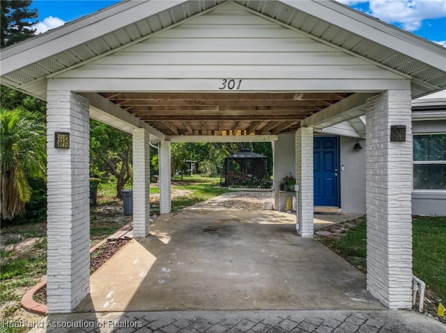 301 Sparrow Ave, Sebring, FL 33870 - view of vehicle parking featuring a gazebo and a carport