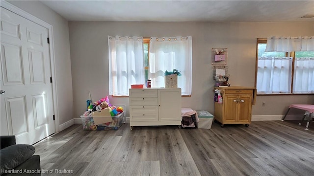 301 Sparrow Ave, Sebring, FL 33870 - game room featuring wood finished floors