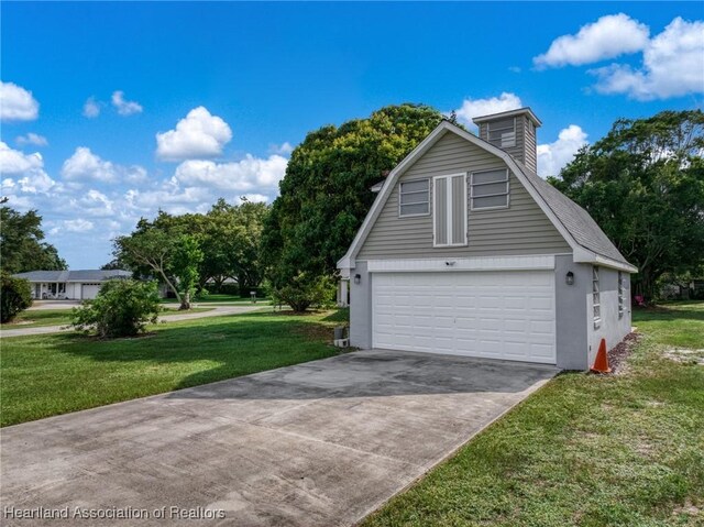 301 Sparrow Ave, Sebring, FL 33870 - garage featuring concrete driveway