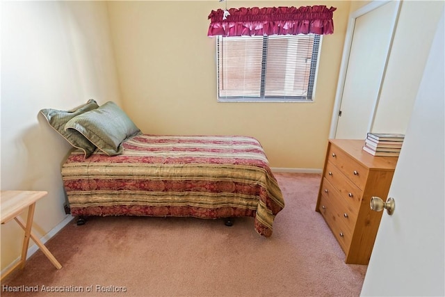 4869 Casablanca Cir Unit G22, Sebring, FL 33870 - bedroom featuring carpet floors and baseboards