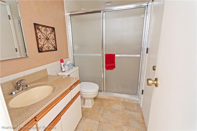 4869 Casablanca Cir Unit G22, Sebring, FL 33870 - bathroom featuring vanity, a stall shower, and tile patterned floors