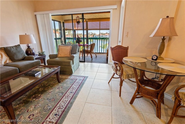 4869 Casablanca Cir Unit G22, Sebring, FL 33870 - living room with a chandelier and light tile patterned floors