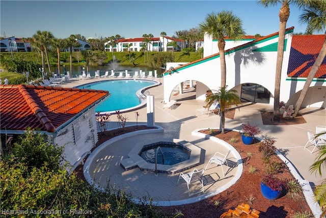 4869 Casablanca Cir Unit G22, Sebring, FL 33870 - view of pool with a community hot tub and a water view