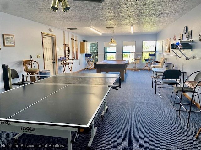 4869 Casablanca Cir Unit G22, Sebring, FL 33870 - playroom with carpet floors, a textured ceiling, and billiards table