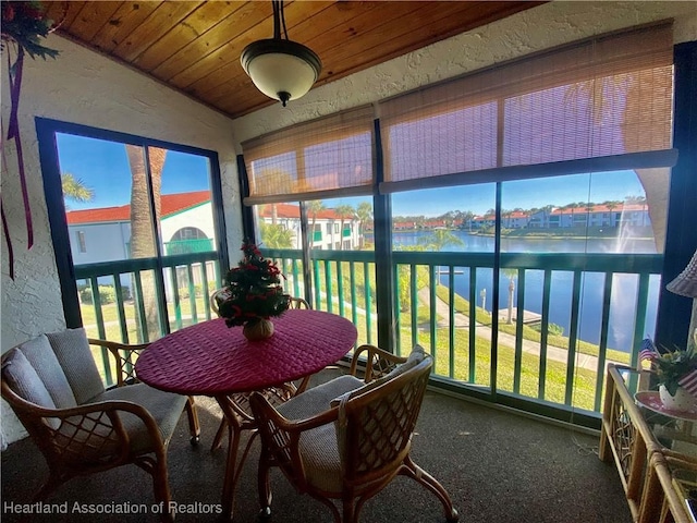 4869 Casablanca Cir Unit G22, Sebring, FL 33870 - sunroom / solarium featuring a water view and wood ceiling