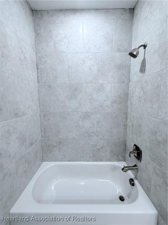 full bathroom with tub / shower combination