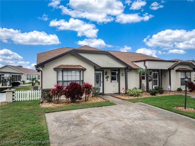 view of front of property with a front lawn